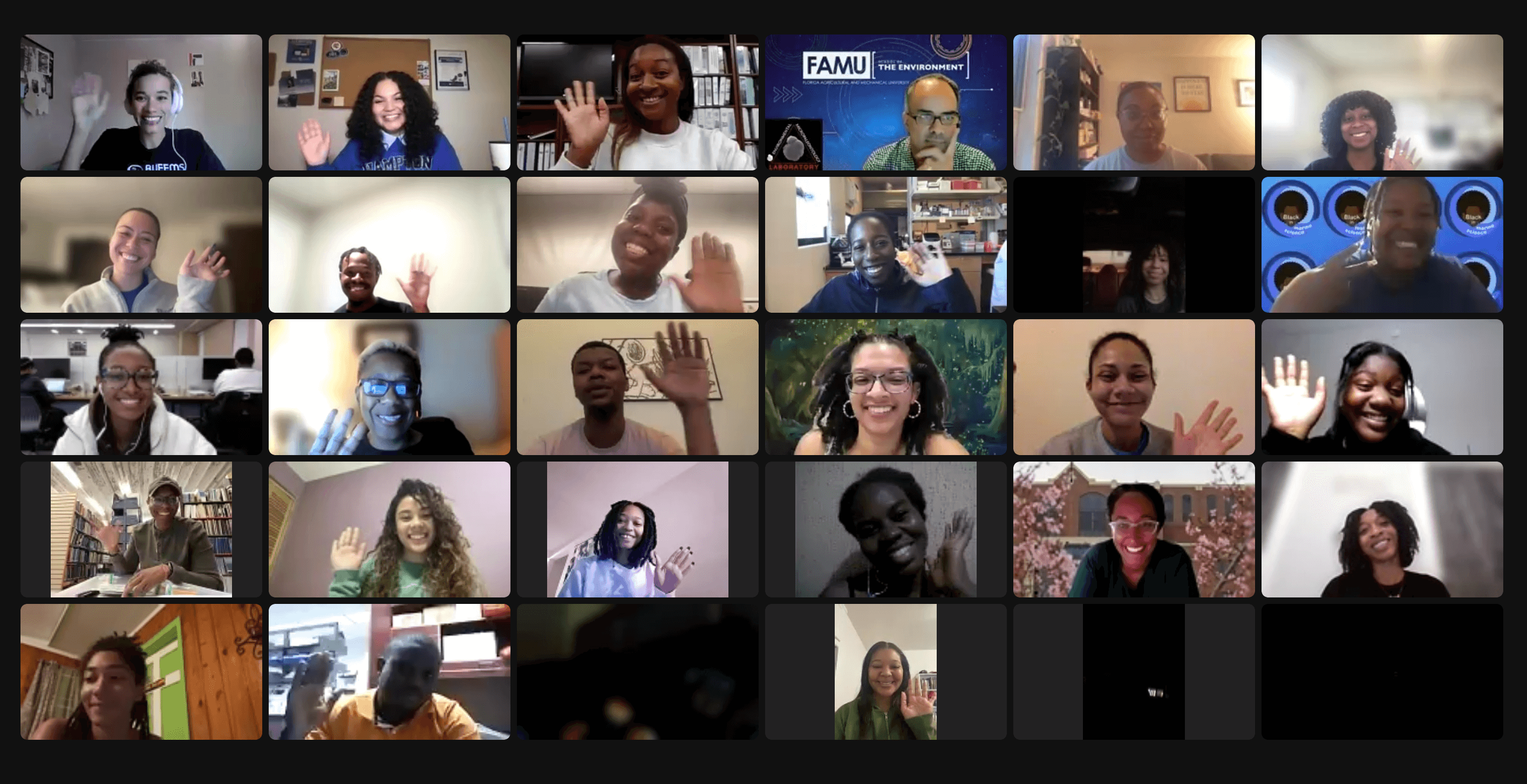 Zoom screenshot of smiling faces of Black people in a 5 by 6 grid. Some are waving
